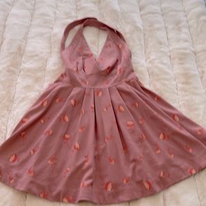 Free people halter style dress. Never worn.   Strappy back